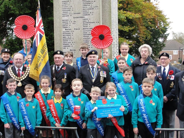 Pupils from Kingsway Primary School join members of the Royal British Legion, appeal organiser Sue Evans and Councillor David Griffiths in 2016.