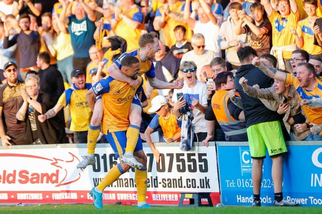 Mansfield Town forward Jordan Bowery celebrates with the fans after scoring Stags' second goal against against Northampton Town in Saturday's play-offs first leg. Photo by Chris Holloway/The Bigger Picture.media