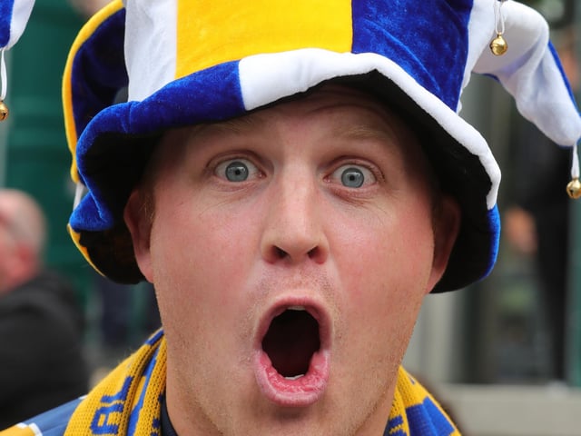 Mansfield Town fans soak up the Wembley atmosphere.