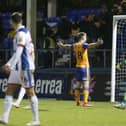 Rhys Oates celebrates his goal with the Stags fans. Photo by Chris Holloway / The Bigger Picture.media