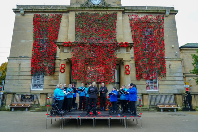 After the parade there was a short service followed by a performance from the Mansfield Community Choir outside the wall of poppies at the Town Hall