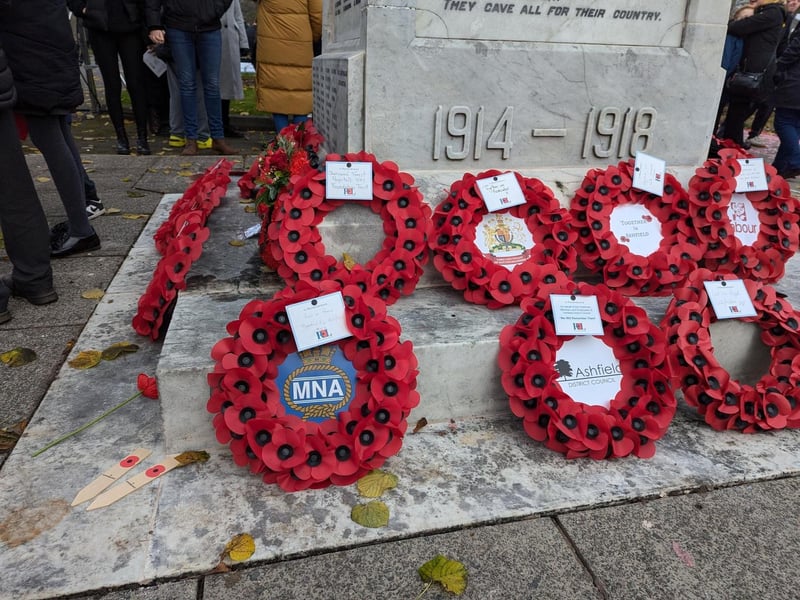 Poppy tributes on the cenotaph.