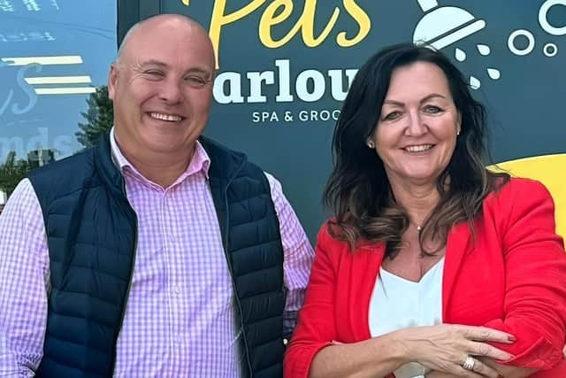 Paul Lewis, managing director at PSR, celebrating the purchase of the Pets & Friends brand with Claire Baylis, chief executive of previous owners Kennelpak. Photo. Submitted
