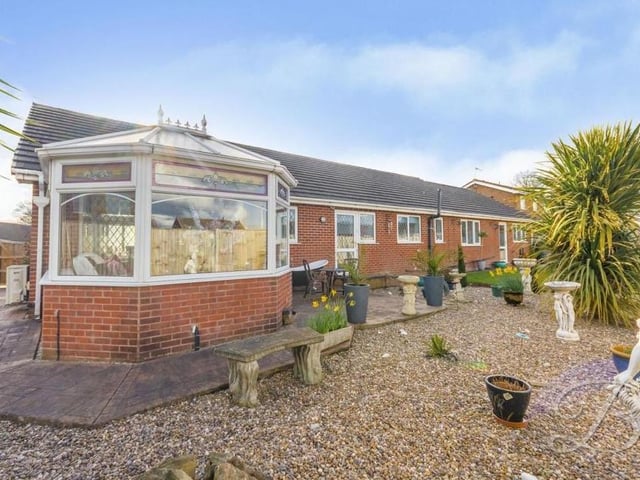 A first peek at the extensive garden at the rear of the £380,000-plus property. The conservatory is to the left.
