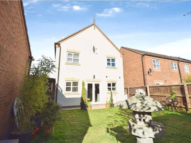 The rear garden is predominately laid to lawn with fence surround & gated access to the front.