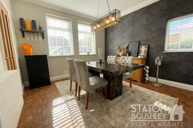 The dining room at the £495,000-plus home is a delightful space for family meals or for entertaining friends. The wooden floor is a striking feature, as are uPVC double-glazed windows facing the front and side of the property.