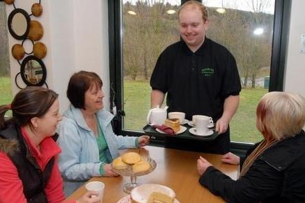 Student Daniel Hucknall served coffee and cake at Rumbles cafe in Clipstone in 2009.