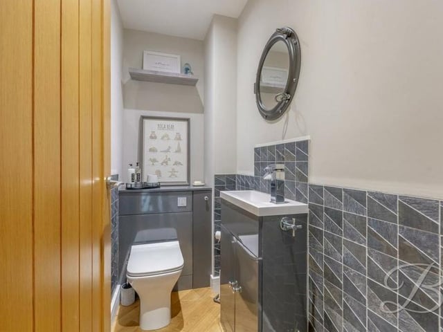 Even the downstairs toilet, with low-flush WC and pedestal sink, is immaculately presented at the £650,000 Northfield Avenue house.