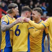 Baily Cargill is congratulated on his goal during the Sky Bet League 2 match against Crawley Town FC at The Broadfield Stadium, Saturday 16 December2023 
Photo credit -  Chris & Jeanette Holloway / The Bigger Picture.media