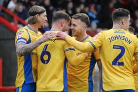 Baily Cargill is congratulated on his goal during the Sky Bet League 2 match against Crawley Town FC at The Broadfield Stadium, Saturday 16 December2023 
Photo credit -  Chris & Jeanette Holloway / The Bigger Picture.media