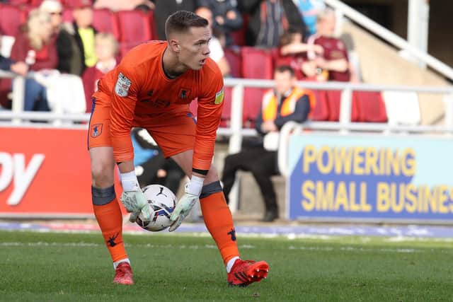 Nathan Bishop of Mansfield Town in action at Northampton.