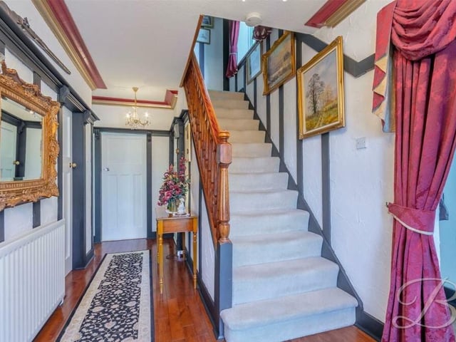 The hallway also contains the staircase that leads to the first floor of the Kirkby house.