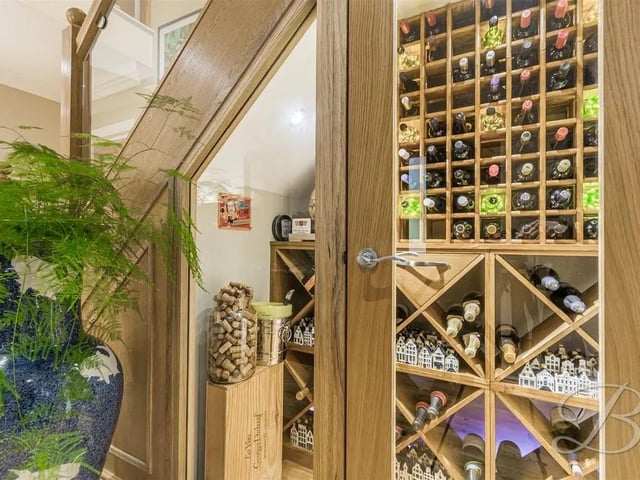 The impressive wine cellar just under the stairs