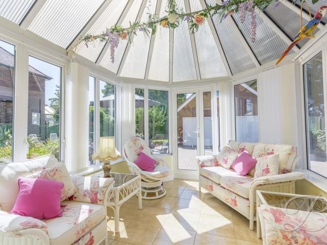 The conservatory is a superb space, filled with natural light, thanks to windows that overlook the rear garden. It also benefits from underfloor heating.
