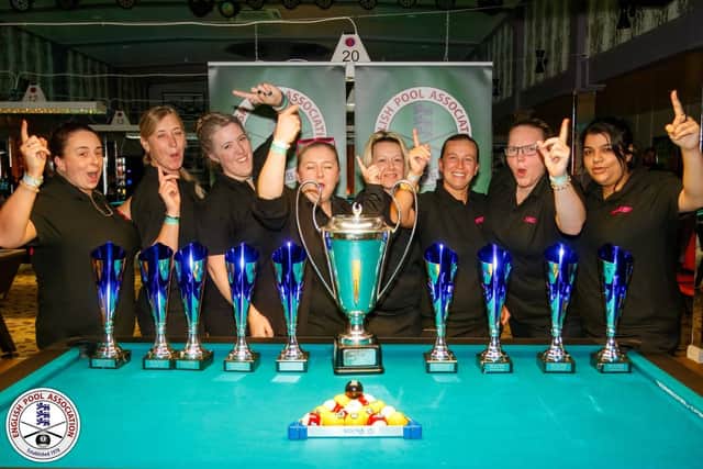 Notts Pots players celebrate their national cup success.