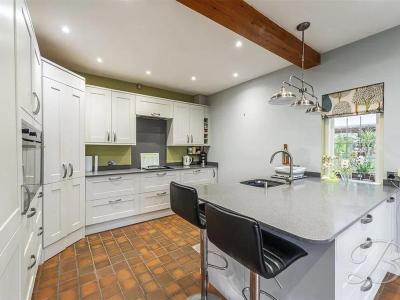 Featuring a breakfast bar area which hosts a wonderful space to sit and enjoy your morning coffee, whilst dividing the areas. This room is fitted with a window to the rear and access to an inner hallway.