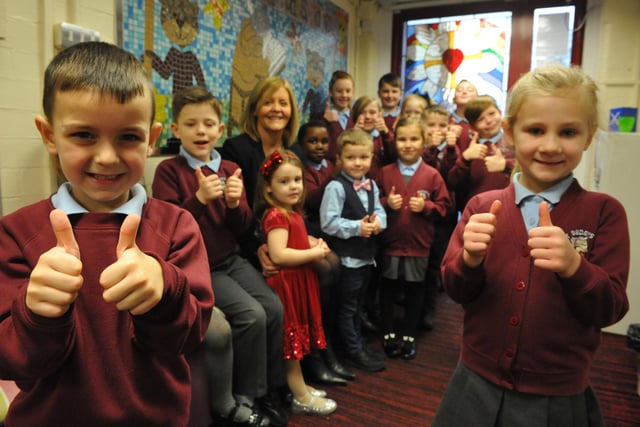 St Bede's RC Primary School, Jarrow, celebrate the schools good Ofsted report with headteacher Moya Rooney. Can you spot anyone you know in the photo?