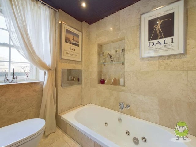 A second shot of the first en suite bathroom, which is bright and bonny.