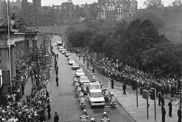 The Popemobile carrying Pope John Paul II makes its way down the Mound from the Assembly Hall in Edinburgh in June 1982. 