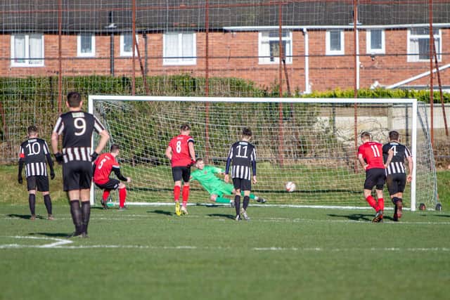 Ryan Bates sent Sam Ogden the wrong way from the spot to win the local derby for Shirebrook. PHOTO: Dan Walker