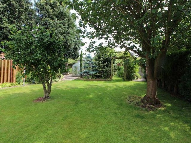 A last look at the garden, with its well-maintained lawns.