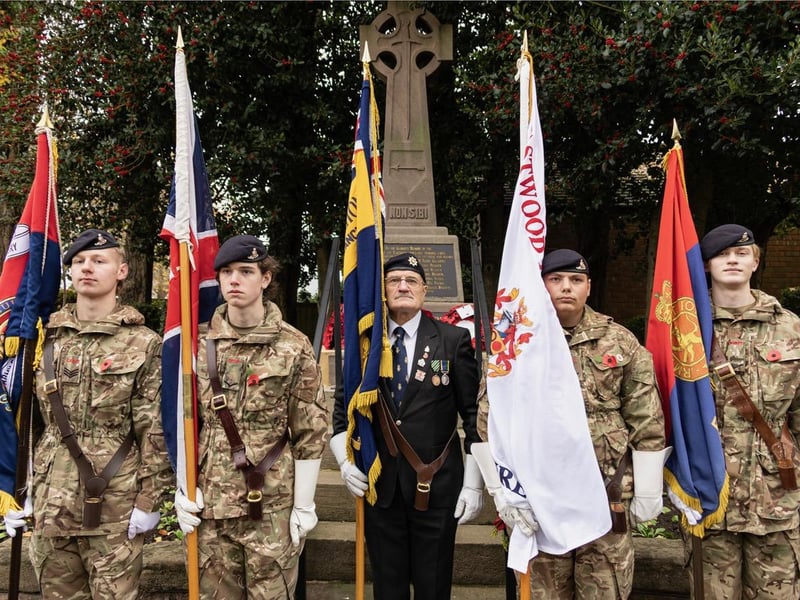 Flag bearers at the Cadets Cross war memorial in Eastwood.