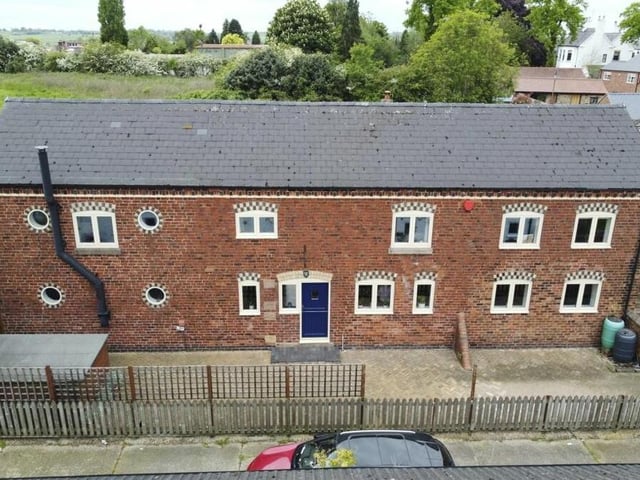 Stepping back outside now, and here is another view of the distinctive exterior of the Manor Farm Mews property.