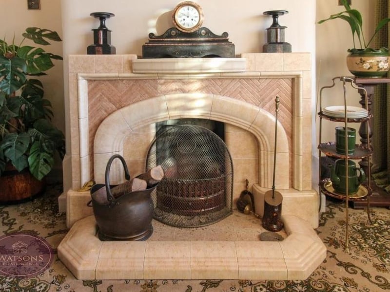 Here is a close-up of the lovely feature fireplace in the dining room.
