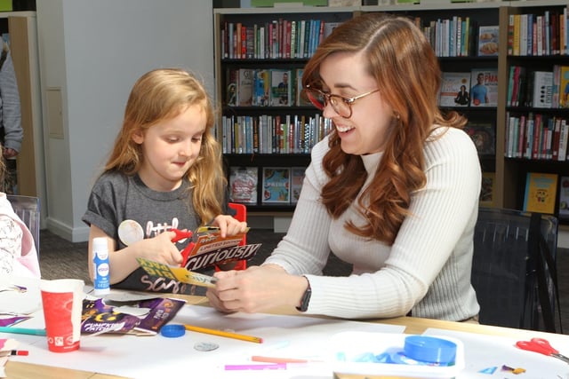 Samantha and Abigail Gilbert try out the craft activities
