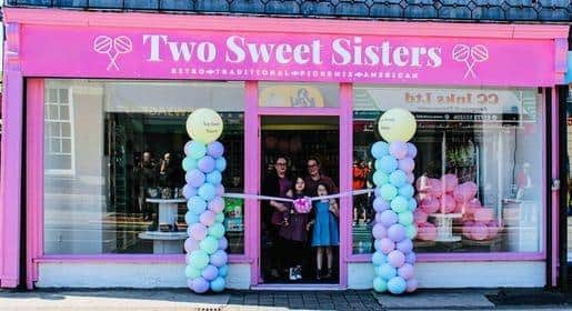 The shop looks vibrant and exciting with its bright pink exterior.