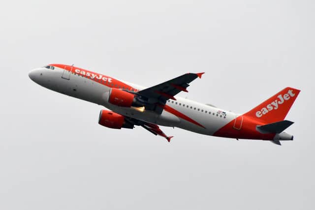 An Airbus A320-214 of British airline Easyjet. (Photo by PASCAL PAVANI / AFP) (Photo by PASCAL PAVANI/AFP via Getty Images)