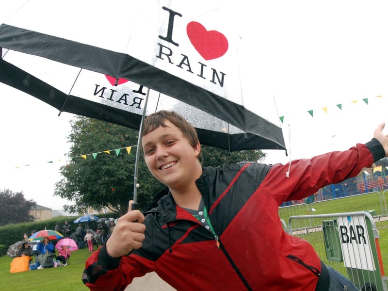 Ricky Wood from Shirebrook with his I Love Rain umbrella. Party in the Park, 09.