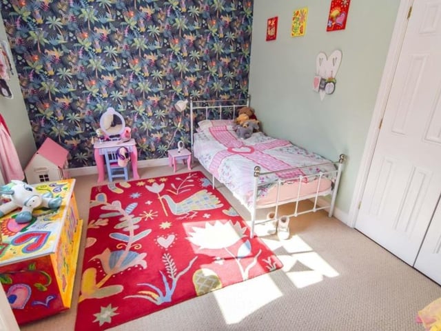 This bedroom is currently being used as a children's room. They must love it!