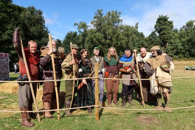 Nottinghamshire County Council chairman Cllr Richard Butler with the Sherwood Outlaws.