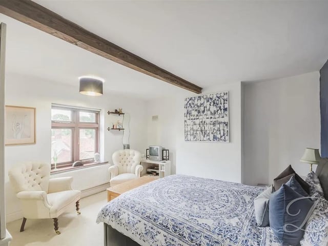 One of four stylish bedrooms in the main house.