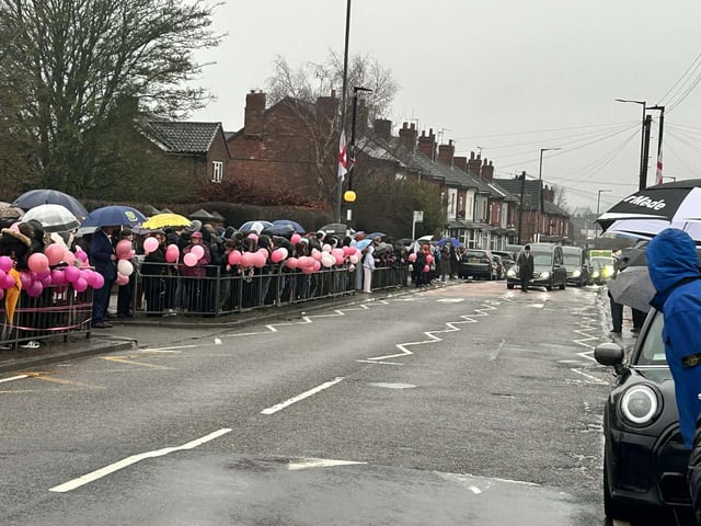 The funeral cortege as it approaches Quarrydale Academy in Sutton