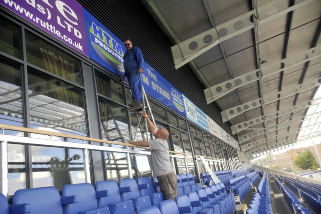 The finishing touches are done to the advertising hoardings.