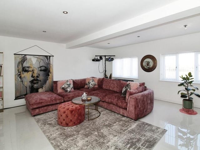 Next stop at the Ratcliffe Lane property is this striking living room, which injects individuality to the house.