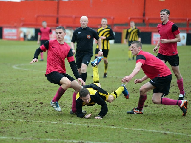 Pride of Shirebrook (pink strip) v Ashfield Scaffolding in an U18's final at Alfreton Town.