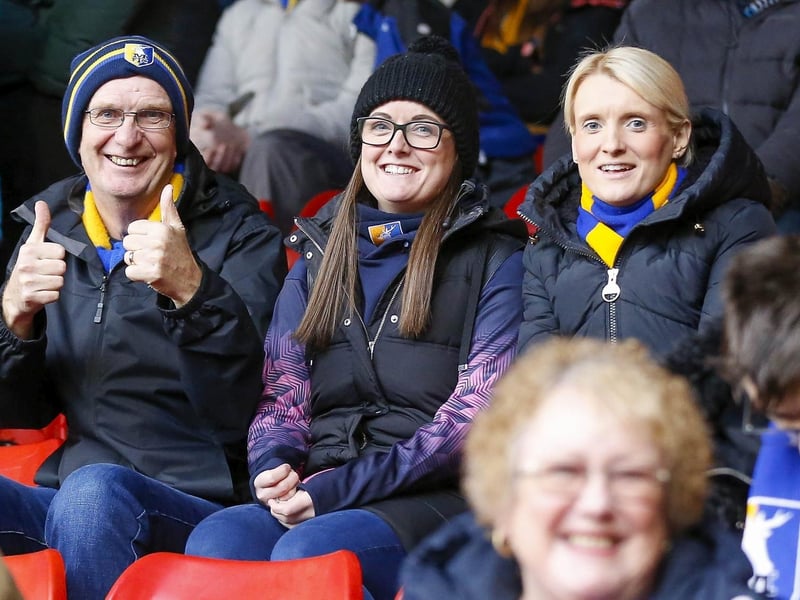 Stags fans watch the Sky Bet League 2 match against Walsall FC at the Bank's Stadium.