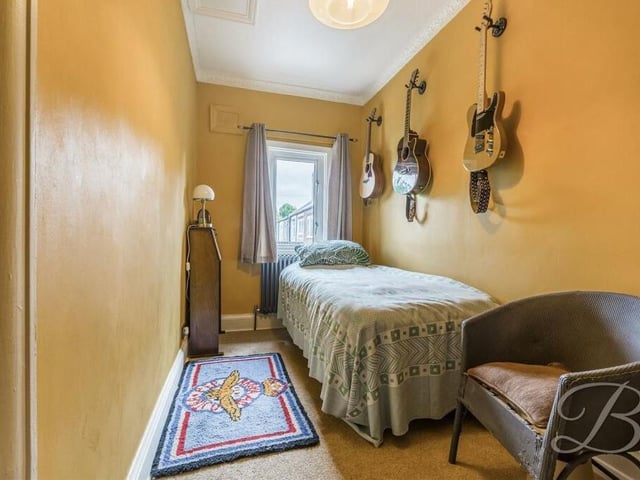 The last of the four bedrooms is a slimline single, overlooking the front of the Selston Road house. It has a carpeted floor and coving to the ceiling.