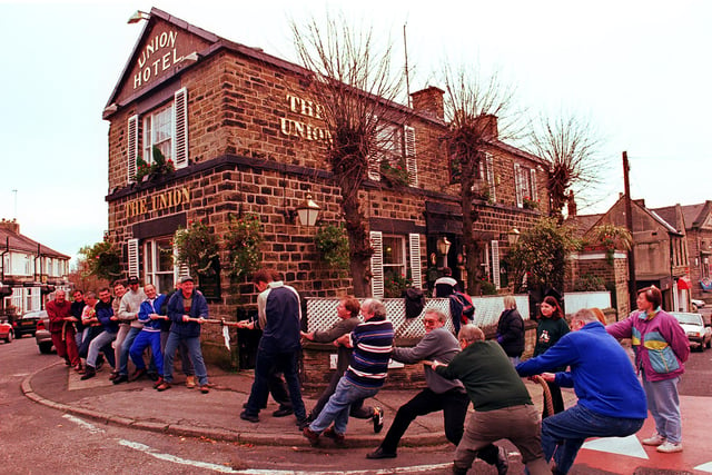 Regulars at the Union Hotel, Nether Edge pulled themselves together in a tug of war contest to raise money for Alzheimer's Disease Association in November 1999. Pictured are the Merlin Theatre and  St Andrew's Scouts teams.
