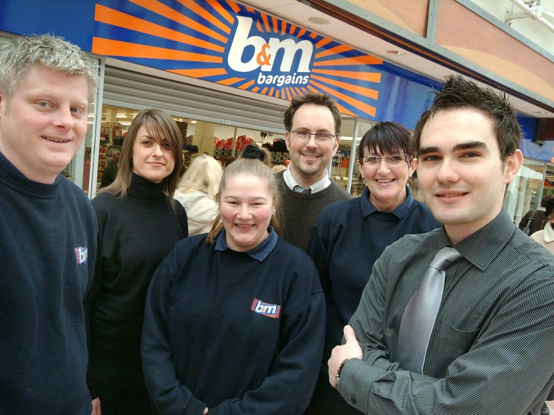 Pictured on the opening day of B&M Bargains in the Idlewells centre, Sutton, on are from left, it's floor manager Marc Orli, visiting managers from other stores Angie Smith, Liz Johnston, Kerry Beard and Corinna Barnsley with assistant manager Tom Briggs.