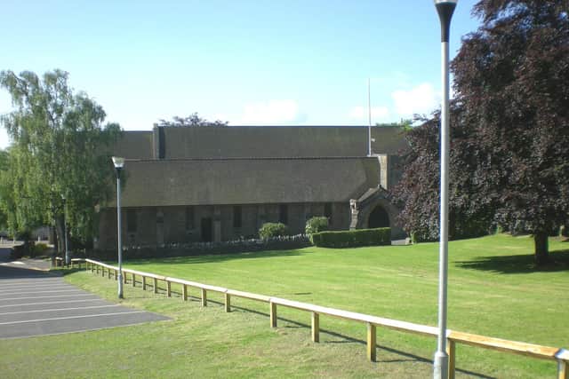 The tractor mower was used to cut the grass close to All Saints' Church in Huthwaite