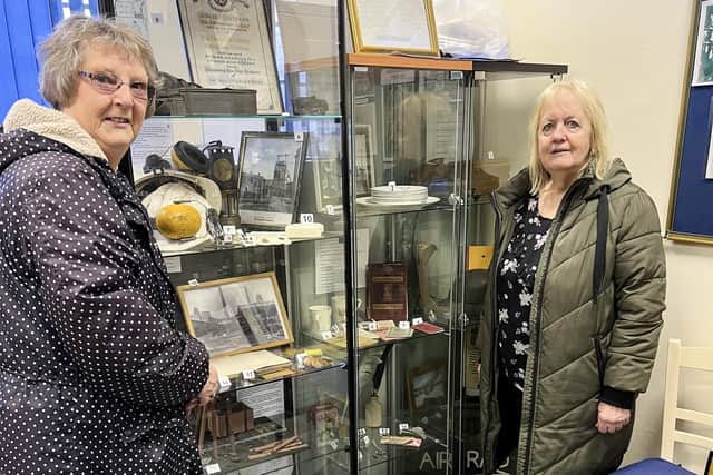 Sandra Peake (right), representing the parish council, at the centre's new base with Kath Sharpe, of the Langwith and Whaley Thorns Heritage Association.