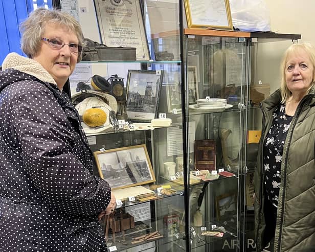 Sandra Peake (right), representing the parish council, at the centre's new base with Kath Sharpe, of the Langwith and Whaley Thorns Heritage Association.