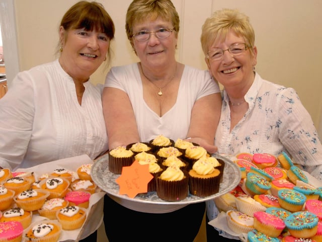 Annee Quinn, Pat Smith and Agnes Hartshorn selling their Easter cakes at the Oaklands Easter Fair in Warsop ten years ago in 2010
