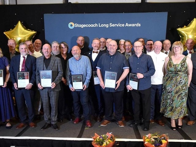 Stagecoach's bus drivers, engineers, cleaners and support teams with their awards at the annual Long Service Awards presentation