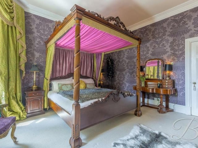 Another beautifully presented bedroom, with fitted carpets and a window facing the back of the house.