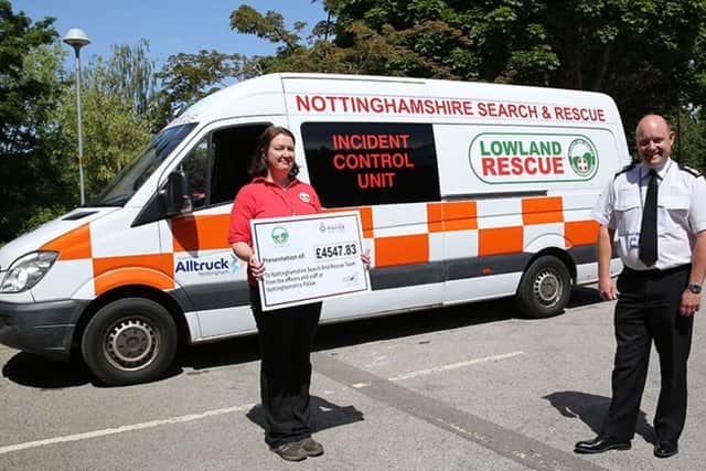 The Chief Constable of Nottinghamshire Police presents Nottinghamshire Search and Rescue Team (NSART) with a cheque for £4,500.